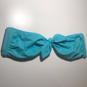 Strapless VS bathing suit top.